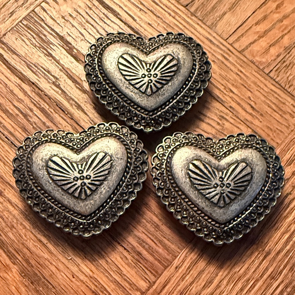 HEART - Shaped antique silver toned belt buckle One sold at a time .